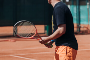 Tennis tournament championship on outdoor clay court with net, professional athletes play in motion with rackets serve tennis ball during tennis match game, tennis training in a sunny day on a stadium