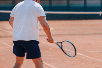 Tennis tournament championship on outdoor clay court with net, professional athletes play in motion with rackets serve tennis ball during tennis match game, tennis training in a sunny day on a stadium