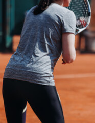 Tennis tournament championship on outdoor clay court with net, professional athletes play in motion with rackets serve tennis ball during tennis match game, tennis training in a sunny day on a stadium