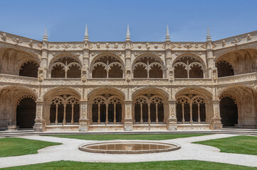 Fototapeta premium The courtyard of the Jeronimos Monastery on a summer day in Lisbon, Portugal.