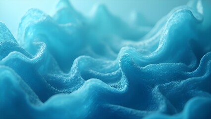 Abstract blue wave texture in cool hues representing fluid motion and depth