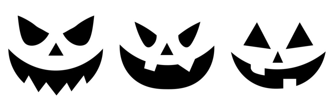 Symbols of the holiday. Ilustraci&oacute;n vectorial. Creepy evil ghost heads with angry eyes and spooky mouth. Cute autumn celebration symbol. Set of Halloween scary pumpkins cut. Jack face. An evil smile.