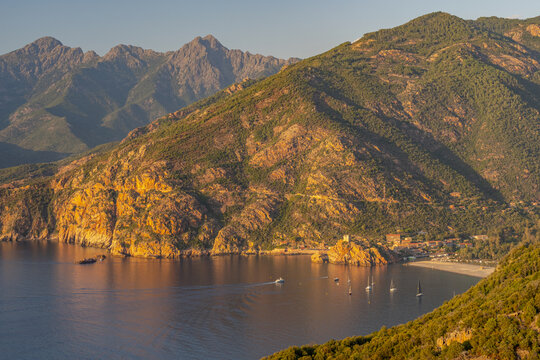 View of Porto town with Genoise de Porto Ota tower, Corsica island, France.