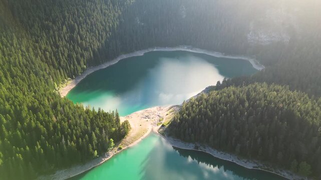 Drone flying over Crno lake in Montenegro national park