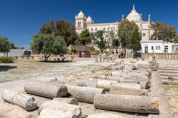 Ancient columns and statues of Carthage near the Saint Louis Cathedral on Byrsa hill, Tunisia.