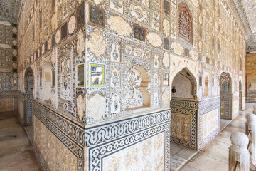 Amber Fort Jaipur Rajasthan glass room known as Sheesh Mahal with intricate artwork using mirror mosaic and convex glass, India.