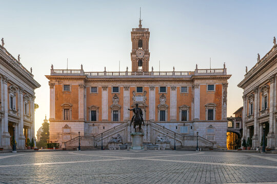 Piazza del Campidoglio on the Capitoline Hill square with ancient statues and historic architecture in Rome city, Italy, at sunrise. Italian architecture. Travel destination