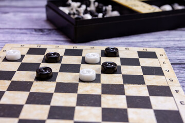 black and white checkers are on the playing field