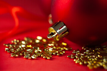 Christmas decoration on red background. Close-up. Copy space.