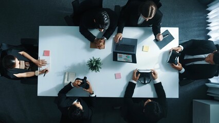 Top view of manager give vr head set to businesspeople while businesswoman prepare data analysis or financial analytic graph in laptop at meeting. Team preparing to enter verse. Directorate.