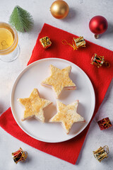 Ham tomato and cheese canape sandwiches in the form of star for Christmas holidays