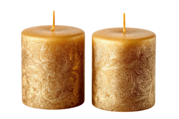 Two elegant golden pillar candles featuring intricate swirling patterns, perfect for festive decor, holidays, or adding a luxurious ambiance. background removed