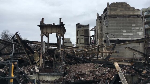 Twisted scaffolding and debris in the burnt aftermath of a building fire in Streetsville, Mississauga, Canada that occurred March 2, 2018.