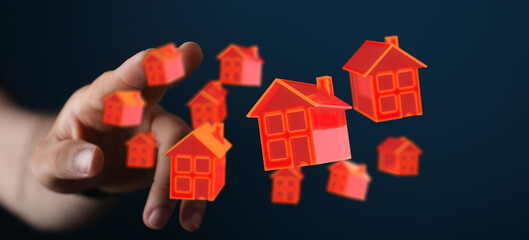 Conceptual image featuring a hand reaching toward floating red houses, representing real estate, property market, and home ownership. Perfect fo