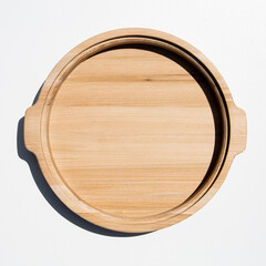 Empty wooden plate on white background