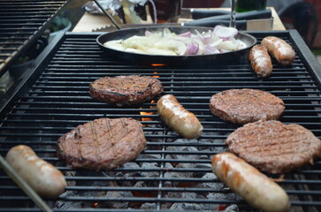 cooking in the garden on a barbecue, tasty summer food outdoors 