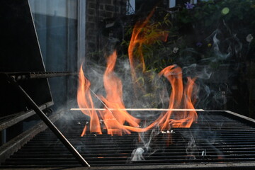 cooking food on charcoal fire summer party fun  