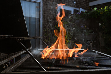 cooking food on charcoal fire summer party fun  