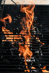 cooking food on charcoal fire summer party fun  