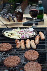 garden barbecue, outdoor living cooking food on charcoal fire summer party fun  