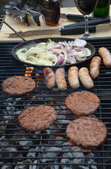 garden barbecue, outdoor living cooking food on charcoal fire summer party fun  