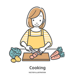 野菜をカットする若い女性