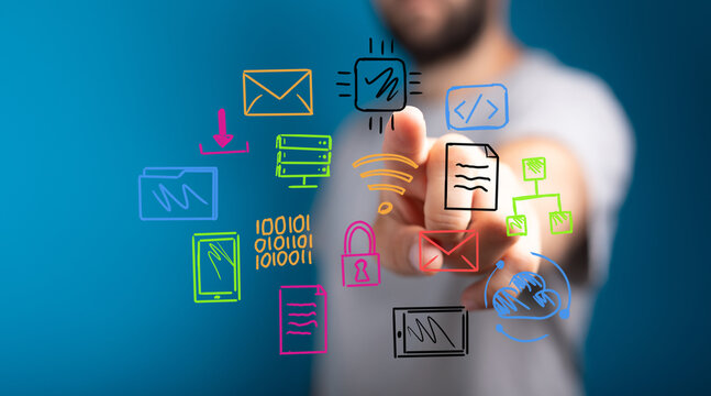 Hand pointing at digital icons, representing technology, data, communication, and connection.