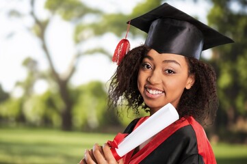 Happy portrait young woman on graduation for celebration