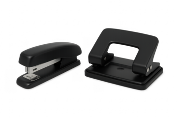 Black stapler and hole punch on transparent background