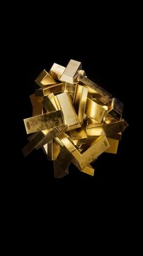 Numerouse warm yellow shiny pure gold bars scattered and moving around center of the frame on the black background. Vertical 3d animation of gold ingots with reflection and glow
