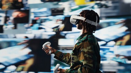 Soldier providing combat support, looking at reconnaissance feeds using VR headset gear. Intelligence agency professional uses battlefield communication network and virtual reality tech, camera B