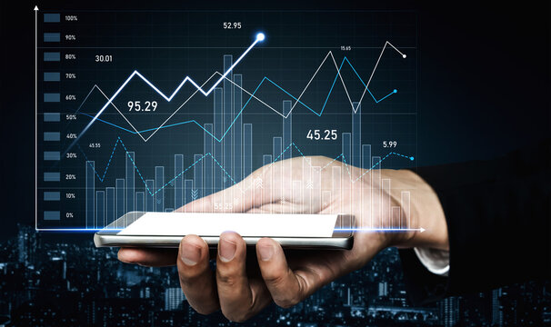 A businessman holds a smartphone with a digital financial graph overlay displaying market trends and growth data, set against an urban backdrop, capturing innovation in finance. Scalp