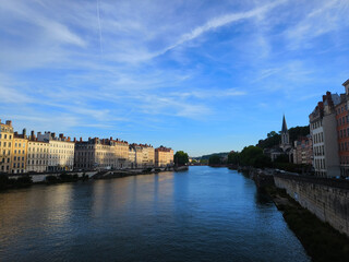 Lyon, France, May 29, 2025, View of the Rhone River and its embankment, waterfront Blue Sky