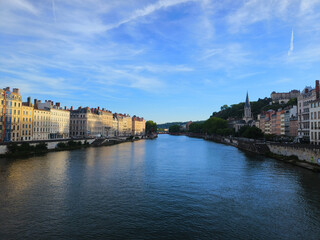 Lyon, France, May 29, 2025, View of the Rhone River and its embankment, waterfront Blue Sky