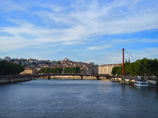 Lyon, France, May 29, 2025, View of the Rhone River and its embankment, waterfront Blue Sky