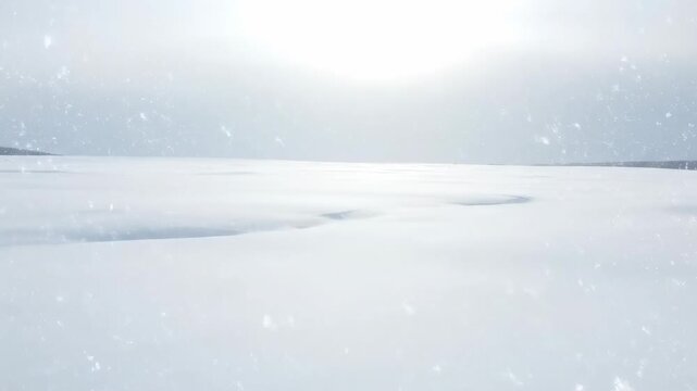 Drone aerial shot capturing vast untouched snowfields as delicate flakes descend from a serene winter sky vista, pure, Drone