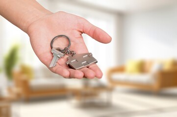Young couple holding new house key