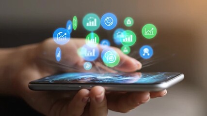 A hand holds a smartphone overlaid with digital icons in a futuristic interface - Powered by Adobe