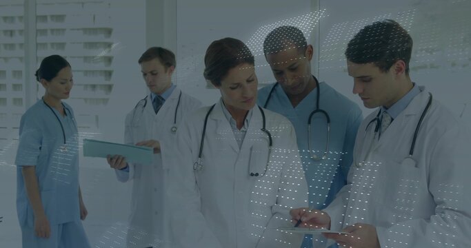 Group of five med staff in uniforms discussing patient data in corridor using tablet stethoscopes - Powered by Adobe