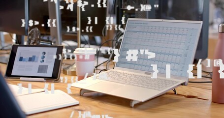Laptop on stand displaying spreadsheet in office, with tablet charts, coffee cup, water bottle © vectorfusionart
