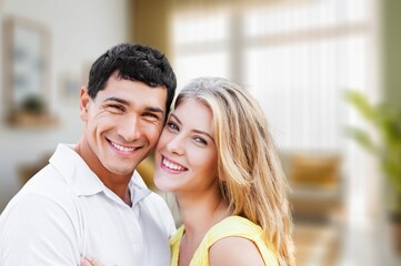 Happy young Couple hug in apartment