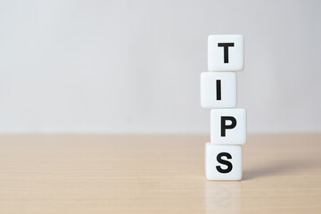 Tips written on white dice