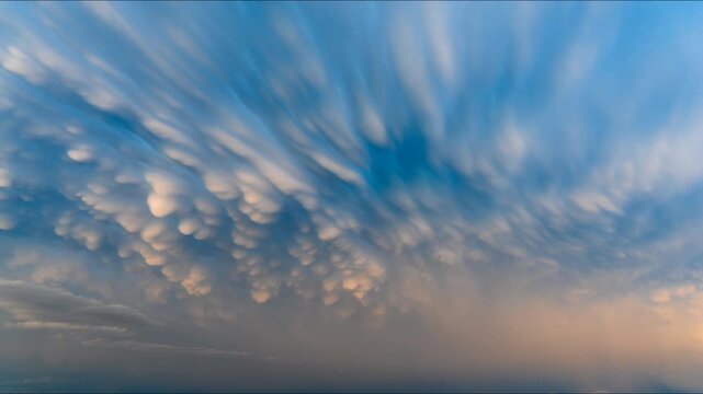Storm clouds glowing orange at sunset revealing natures beauty 
