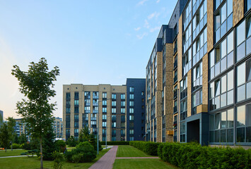 New modern block of flats in green area at night. residential apartment with flat buildings exterior. luxury house complex. Part of City Real estate property, condo architecture. apartment