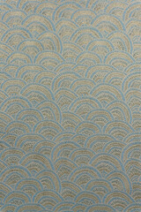 Gray-beige jacquard fabric texture with Seigaiha wave pattern and yellow metallic lurex, textile collection