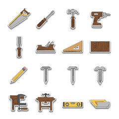 Collection of carpentry tools arranged neatly on white surface showcasing craftsmanship and precision in woodworking workshop.