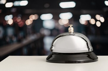 Empty reception desk with service call bell