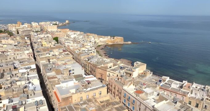 Aerial view of Torrino Conca and the beach of the Mura di Tramontana, located in the historic center of Trapani, Sicily, Italy. It is a beautiful city overlooking the Mediterranean Sea.