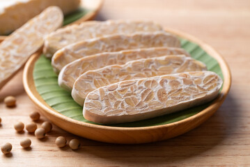 Tempeh made from fermented soybeans, Traditional Indonesian food, Healthy vegan and plant based ingredients