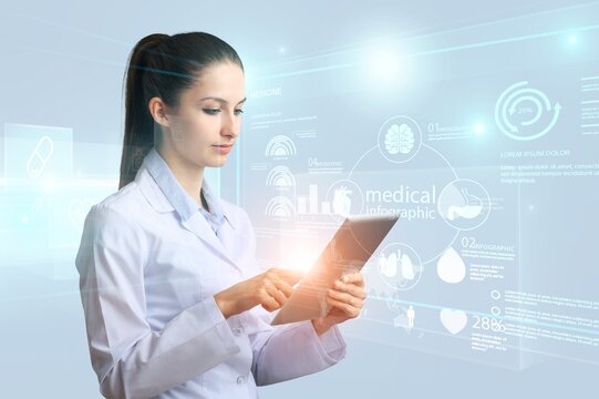 Young advanced doctor enjoying medical technologies, on digital tablet,